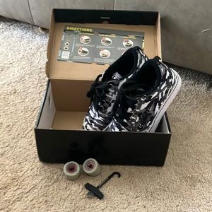 Heelys brand new in box never worn. Cool camo print.